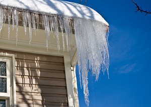 Ice damming on a IA home's roof and gutters